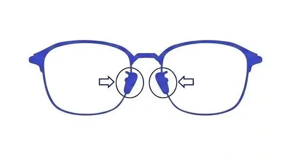 Adjusting nose pads inward for wire frame glasses