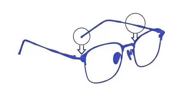 Bending a temple arm for wire frame glasses to level them